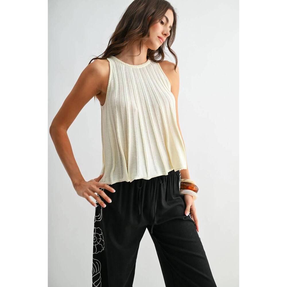 NEW CAMELLIA sleeveless knit top with flared hem in cream